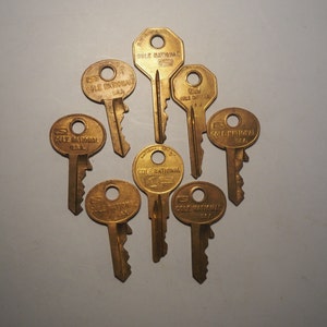 Vintage Cole National Brass Keys - Set of 9 Collectible Keys