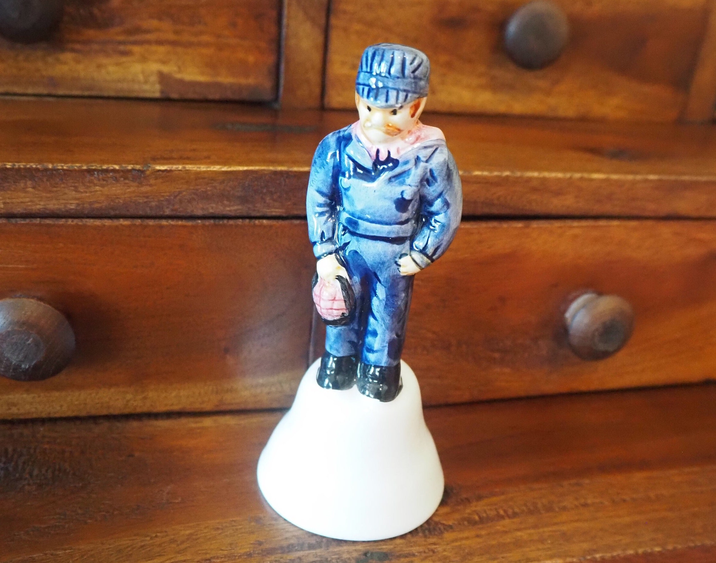 Vintage Train Engineer Figurine Bell: Collectible Kitsch Decor