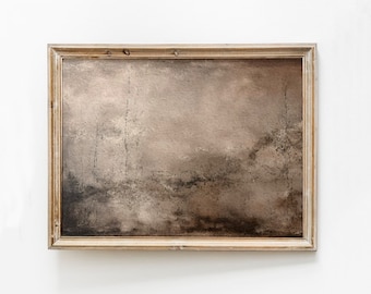 May include: A framed painting with a muted brown and gray abstract landscape. The frame is a light wood color with a distressed finish.