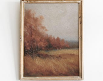 May include: A framed painting depicting a landscape scene with trees in shades of brown and orange, set against a light grey sky. The foreground features a field of brown grass.
