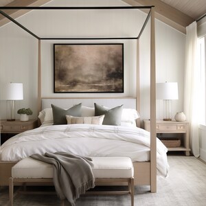 May include: A white canopy bed with a wooden frame and a white headboard. The bed has a white duvet and a gray throw blanket. There are two green pillows and a patterned pillow on the bed. There are two bedside tables with lamps and a rug on the floor.