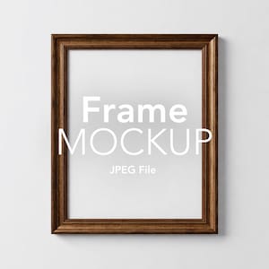May include: A rectangular brown wooden frame with a white interior. The text "Frame MOCKUP" is displayed in white, along with "JPEG File". The frame has a detailed, textured appearance, suitable for displaying artwork or photos.