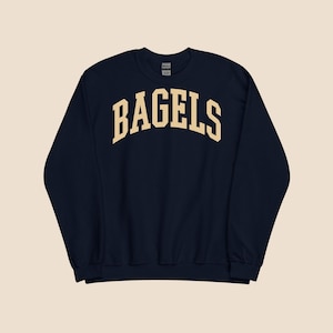 Bluza z kapturem Bagels Unisex – uroczy nowojorski styl z okrągłym dekoltem dla miłośników brunchu, smakoszy i fanów żydowskich delikatesów
