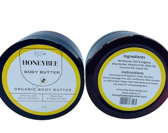 Pode incluir: Dois frascos pretos de Honeybee Body Butter com rótulos amarelos. Os rótulos dizem "Organic Body Butter" e listam ingredientes como manteiga de karité e óleo de vitamina E. Cada frasco contém 227g de produto.