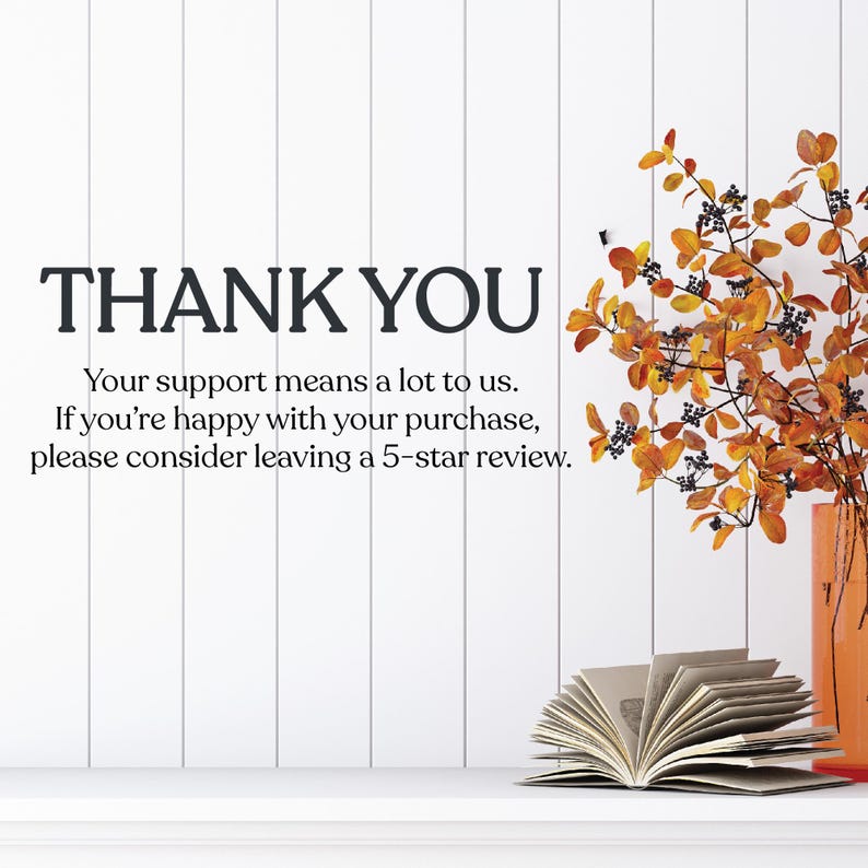 May include: A white ceramic mug with a black handle and the text "But First, Coffee" in a black, handwritten-style font. The mug is on a white surface.