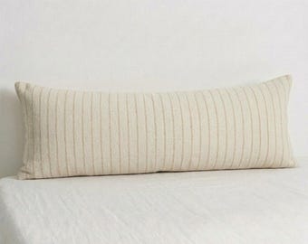 Fodera per cuscino lombare in cotone biologico, a righe marroni neutre, per cuscino lungo.