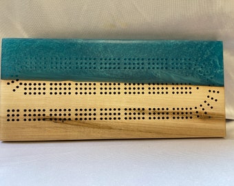 Live Edge Figured Maple Cribbage Board designed with Teal Resin River