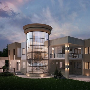 Op de afbeelding: Een modern, twee verdiepingen tellend huis met een grote ronde glazen toren. Het huis heeft een beige buitenkant met grote ramen en een balkon. De toren heeft een wenteltrap binnenin.