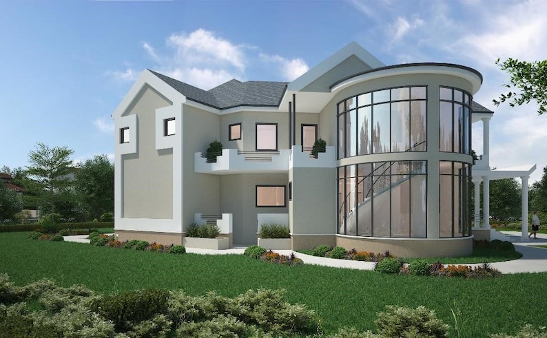 May include: A modern, two-story house with a large, curved window on the right side. The house is painted in a light beige color and has a gray roof. The house is surrounded by green grass and trees.