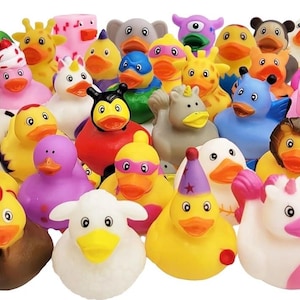 May include: A large collection of small rubber ducks featuring various designs, including animals like elephants, lions, and sheep, as well as characters with party hats, superhero masks, and unicorn horns in a wide array of bright, solid colors.