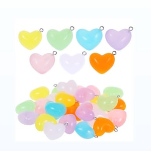 Glow in the dark heart shaped pendant charms