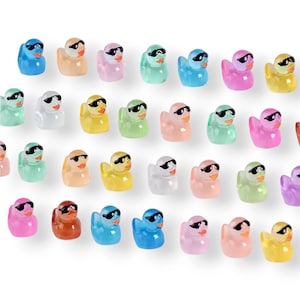 Glow in the dark mini resin ducks with sunglasses