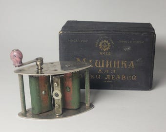 ドイツ製のヴィンテージ革製カミソリ研ぎ器 1920年代のヴィンテージ、ロールフィックス社製ドイツ製カミソリ刃研ぎ