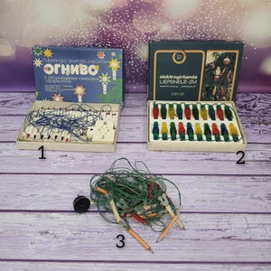 Garland of the USSR in the 1960s. Vintage garland for the Christmas tree. Electric lights on the tree. Christmas lights decoration