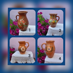 May include: Four brown ceramic jugs with painted floral designs. The jugs are numbered 1 through 4.