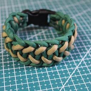 Paracord bracelet. Bowstring.