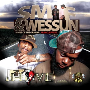 May include: A music album cover featuring two men wearing hats. The album title is "I-LOVE" and the artists are "SMF & WESSUN" with the text "HOME OF THE ORIGINAL GUN CLAPPERZ".