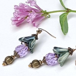 Floral dangling earrings Iridescent verdigris fairy flowers and antique bronze