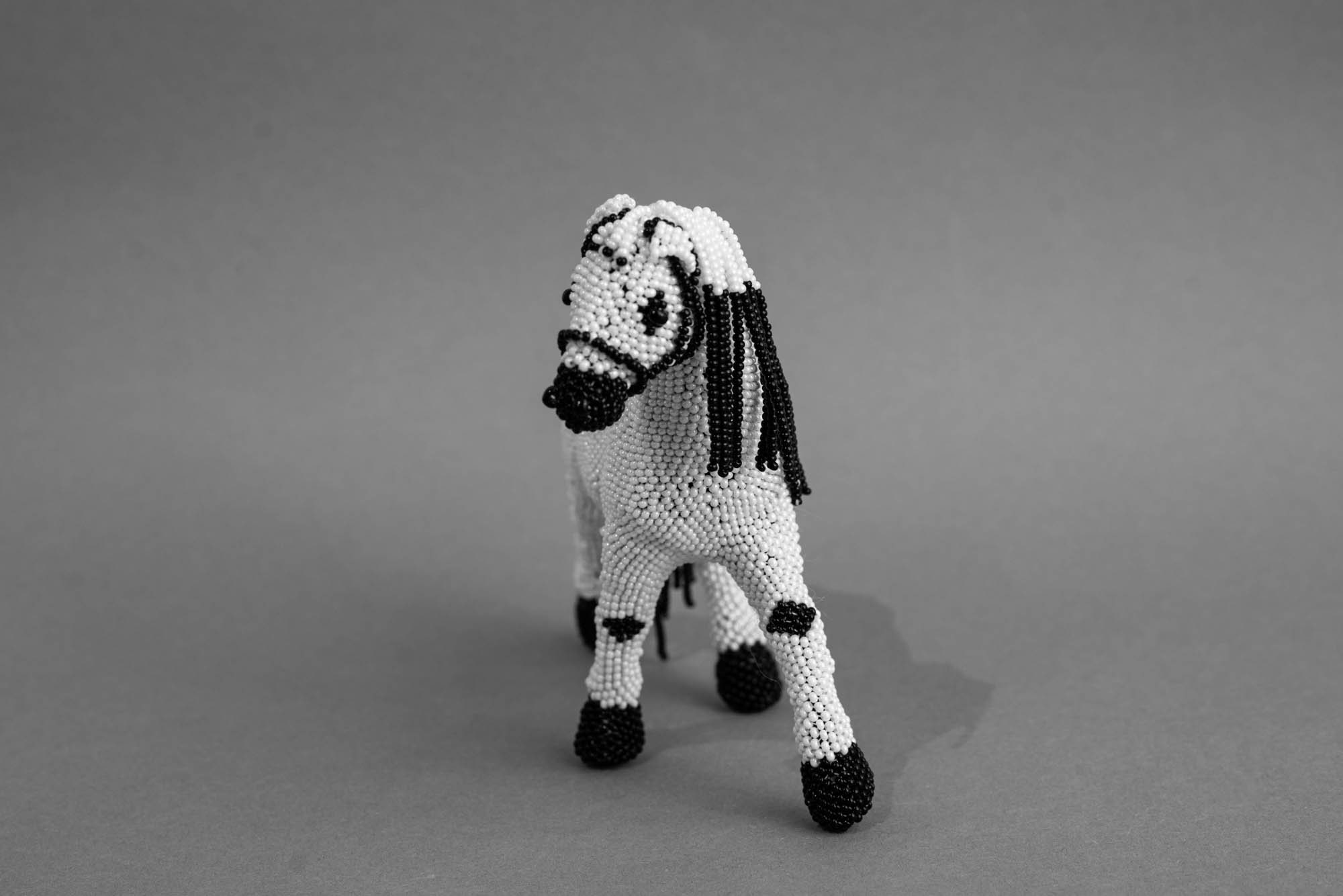 Hand -made beaded horse from Guatemala. Made in a village cooperative using glass beads from Czechoslovakia.