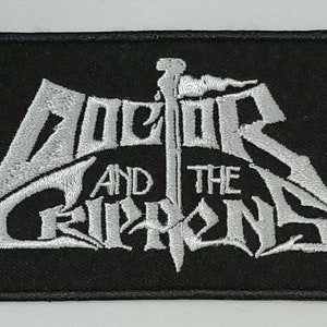 May include: White embroidered patch on a black background with the text "DOCTOR AND THE CRIPTONS".