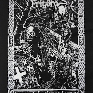May include: Black and white graphic featuring a skeletal figure with long hair, crosses, and the text "Frigora" and "Dance of the Plague-Bearer." The design includes a castle, trees, and a border with skulls.