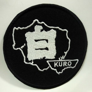 May include: A black and white embroidered patch with the Japanese word "Kuro" in a white banner at the bottom and a white outline of a map of Japan with the Japanese character for "white" inside.