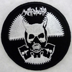 May include: Black and white embroidered patch with a skull wearing a gas mask and the word "WARHEAD" above it.