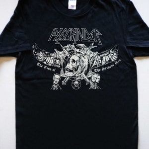 May include: Black t-shirt with a white graphic print of the band "AXXION" with the text "The Rise of the Serpent Men".
