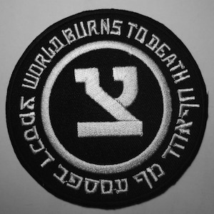 WORLD BURNS To DEATH - embroidered patch severed head of state kegcharge