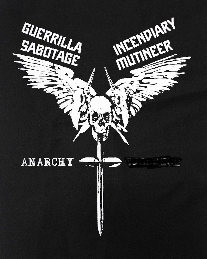 May include: Black graphic design featuring a skull with wings, a sword, and the word "ANARCHY." The text "GUERRILLA SABOTAGE" and "INCENDIARY MUTINEER" are also present in white. The design is bold and striking.