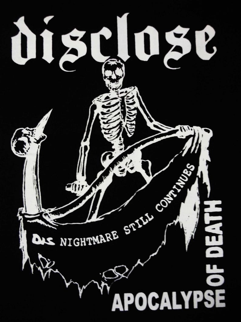 May include: Black graphic featuring a white skeleton figure holding a banner with the text "Das Nightmare Still Continues Of Death Apocalypse". The word "disclose" is at the top. The design is in a gothic style.