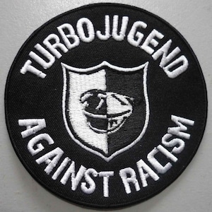 Embroidered patch: Turbonegro ~turbo AC ~ zeke