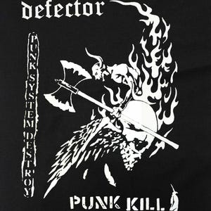 May include: Black graphic with white text and imagery. The word "defector" is at the top. A winged demon figure with an axe is centered, above a skull. The text "PUNK SYSTEM DESTROY" is on the left, and "PUNK KILL" is at the bottom.