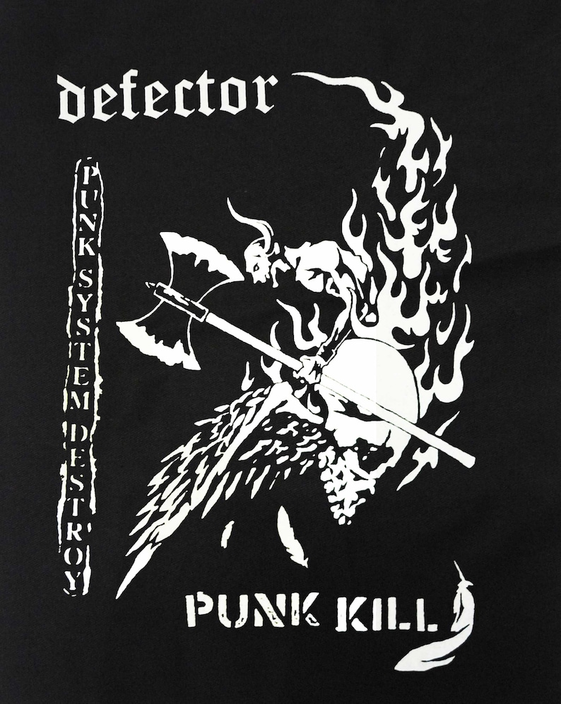 May include: Black graphic with white text and imagery. The word "defector" is at the top. A winged demon figure with an axe is centered, above a skull. The text "PUNK SYSTEM DESTROY" is on the left, and "PUNK KILL" is at the bottom.
