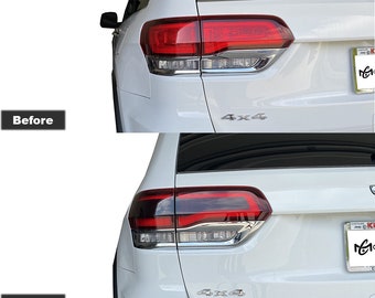 May include: Before and after photos of a white Jeep Grand Cherokee with tinted tail lights. The tail lights are tinted with a dark smoke vinyl wrap. The text "Tail Light Center Only Tint Compatible with 2014-2022 Jeep Grand Cherokee WK2 Premium Tint Vinyl Wrap Dark Smoke 20%" is visible below the image.
