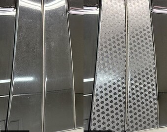 May include: A before and after comparison of a B and C pillar vinyl wrap overlay for a Jeep Grand Cherokee 2011-2022. The left side shows the original smooth black pillar, while the right side displays a black carbon fiber weave pattern.