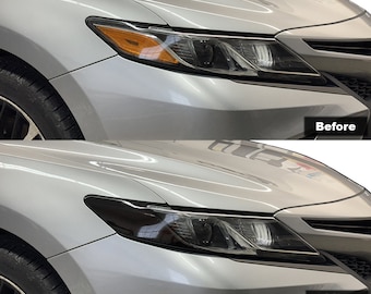 May include: Before and after photos of a silver Toyota Camry with dark smoke headlight tint. The text "Headlight Tint for 2018 - 2024 Toyota Camry Premium Tint Vinyl Wrap Dark Smoke 20%" is at the bottom of the image.