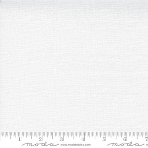 May include: White fabric with a subtle texture. The fabric is a solid white color and has a slightly rough feel.