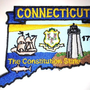 May include: An embroidered patch shaped like the state of Connecticut with the state's name, seal, and lighthouse. The text "The Constitution State" is below the image. The year 1788 is on the right side of the patch.