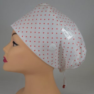 MEDIUM toggle Euro Style Scrub cap; White with tiny red hearts & toggle with or without BUTTONS