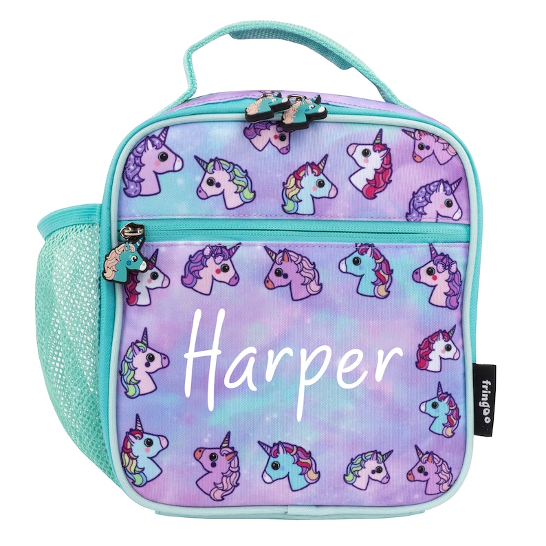 May include: A turquoise and purple lunch bag with a unicorn print and the name "Harper" printed on the front. The bag has a mesh side pocket and a zipper closure.