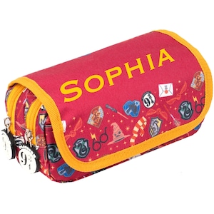 May include: Red pencil case with the name "SOPHIA" in yellow. The case has a yellow trim and is decorated with various Harry Potter-themed icons. The zippers have charms with the number "9" on them.