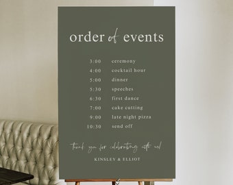 May include: A dark green sign with white text that reads "order of events" and lists the times and events for a wedding reception. The sign is on a wooden easel.