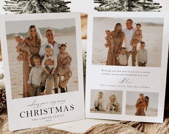 May include: A Christmas card with a photo of a family of seven standing in a desert landscape. The card reads "Wishing you a very merry Christmas, The Lawson Family 2023".