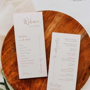 Peut inclure: Deux cartes de cérémonie de mariage au design minimaliste. La carte de gauche porte le texte "Bienvenue à notre mariage Olivia et Jace" et liste l'ordre de la cérémonie. La carte de droite porte le texte "La fête de mariage" et liste les noms des membres de la fête de mariage.