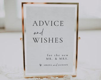 Op de afbeelding: Een gouden lijst met een wit kaartje waarop staat "ADVICE and WISHES for the new MR. & MRS. SERENA and JACKSON".