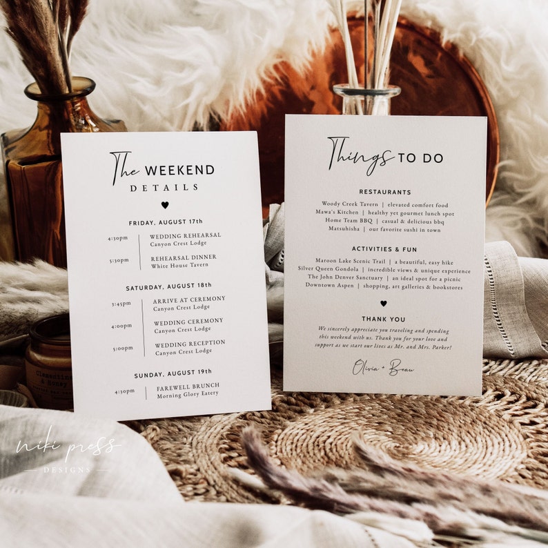 May include: A white card with black text outlining the weekend details for a wedding. The card lists the wedding rehearsal, dinner, ceremony, and reception, all taking place at Canyon Crest Lodge. The card also lists a farewell brunch at Morning Glory Eatery. A second white card with black text lists things to do in the area, including restaurants, activities, and a thank you message.