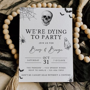 May include: A black and white Halloween party invitation with a skull, spider web, bats, and a ghost. The text reads "We're Dying to Party, Boo's & Booze, Saturday, Oct 31, 7 o'clock, The Parkers, 1123 Spooky Ridge, RSVP to Karlie, 123-456-7890, Don't be caught dead without a costume."