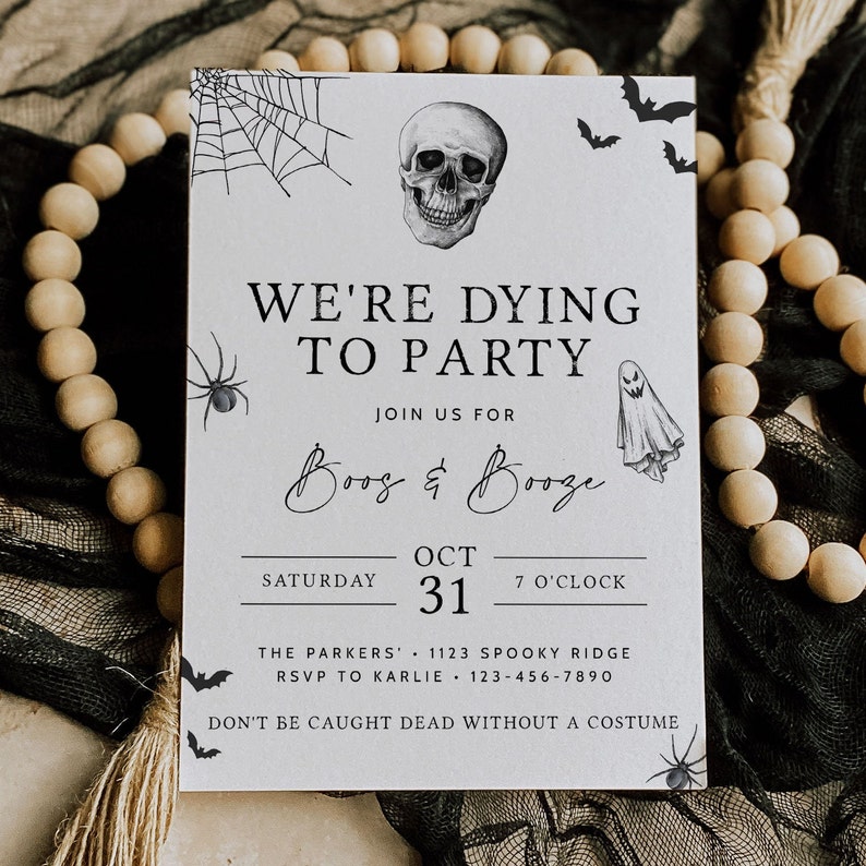 May include: A black and white Halloween party invitation with a skull, spider web, bats, and a ghost. The text reads "We're Dying to Party, Boo's & Booze, Saturday, Oct 31, 7 o'clock, The Parkers, 1123 Spooky Ridge, RSVP to Karlie, 123-456-7890, Don't be caught dead without a costume."