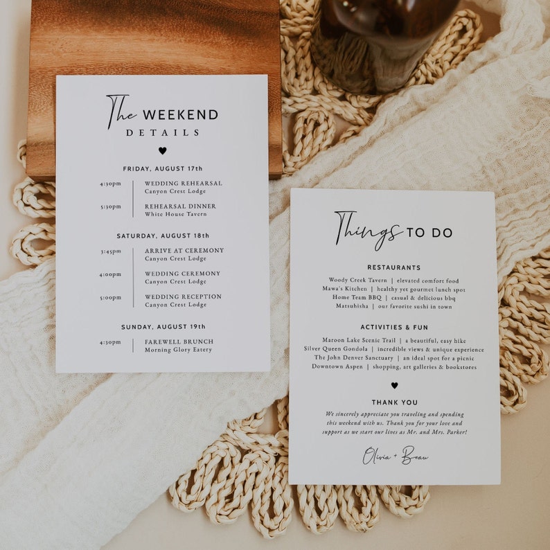 May include: Two white cards with black text. The first card lists the weekend details for a wedding, including the date, time, and location of the wedding rehearsal, ceremony, and reception. The second card lists things to do in the area, including restaurants and activities. The text on the second card reads "Things to do".